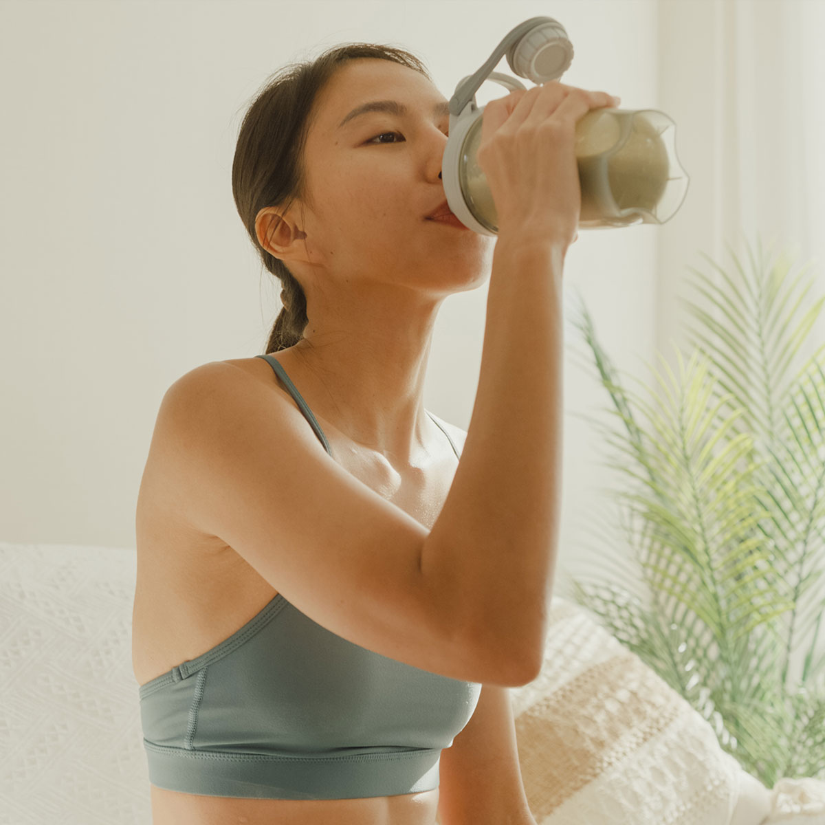 woman drinking shake