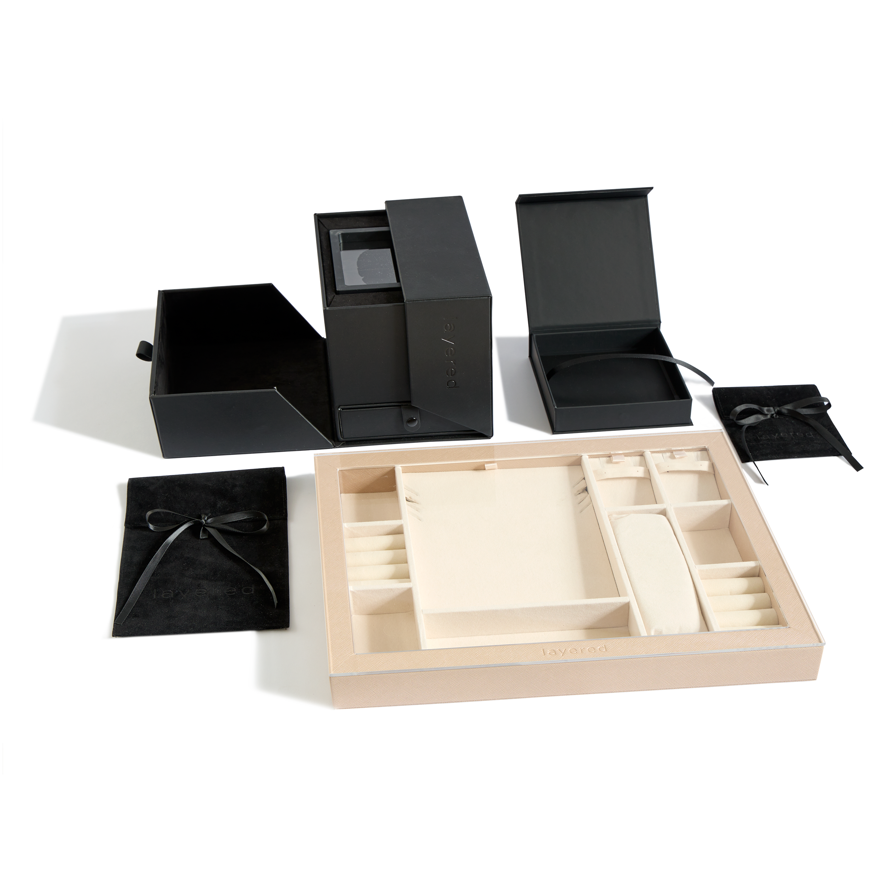 three jeweler storage boxes