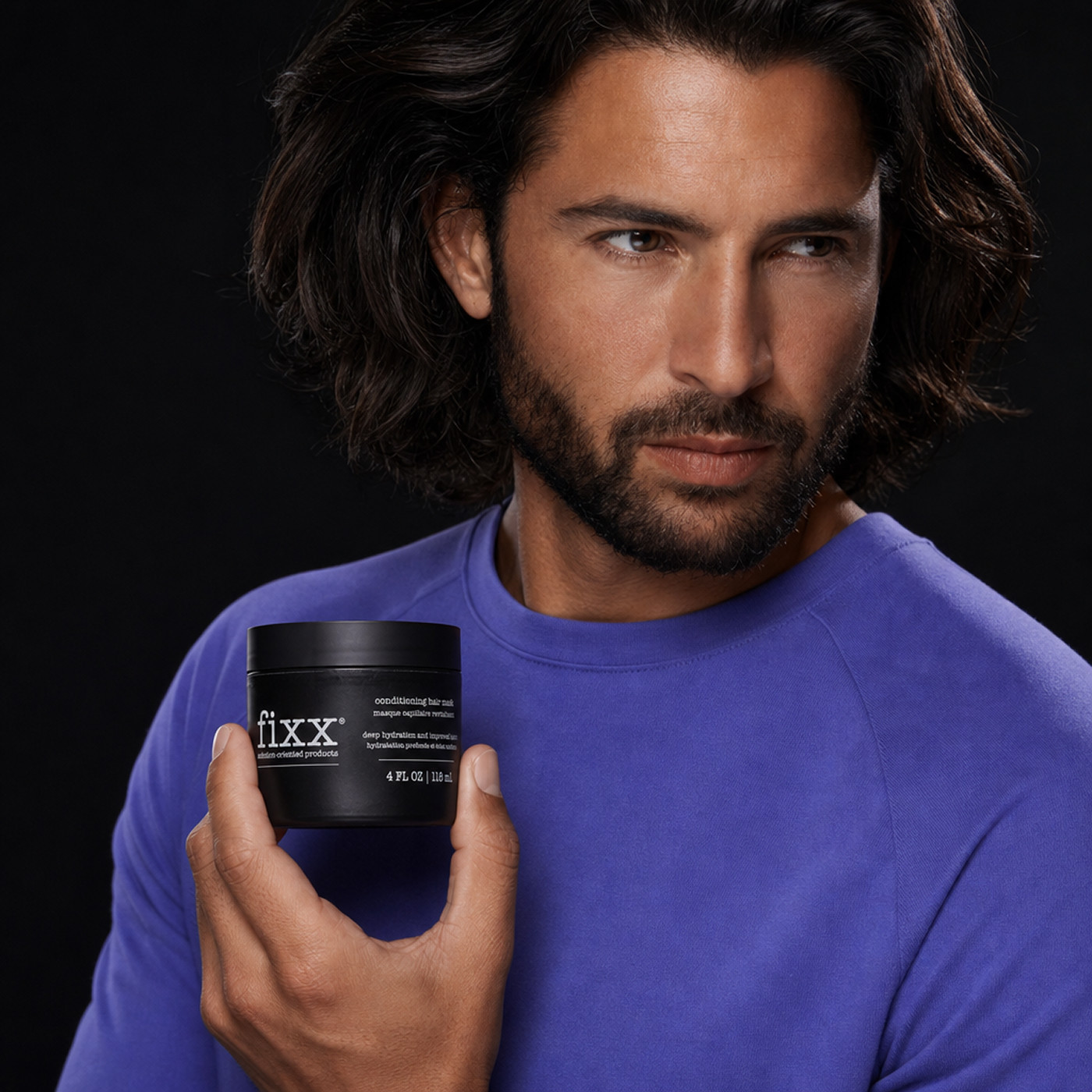 men holding Fixx hair mask