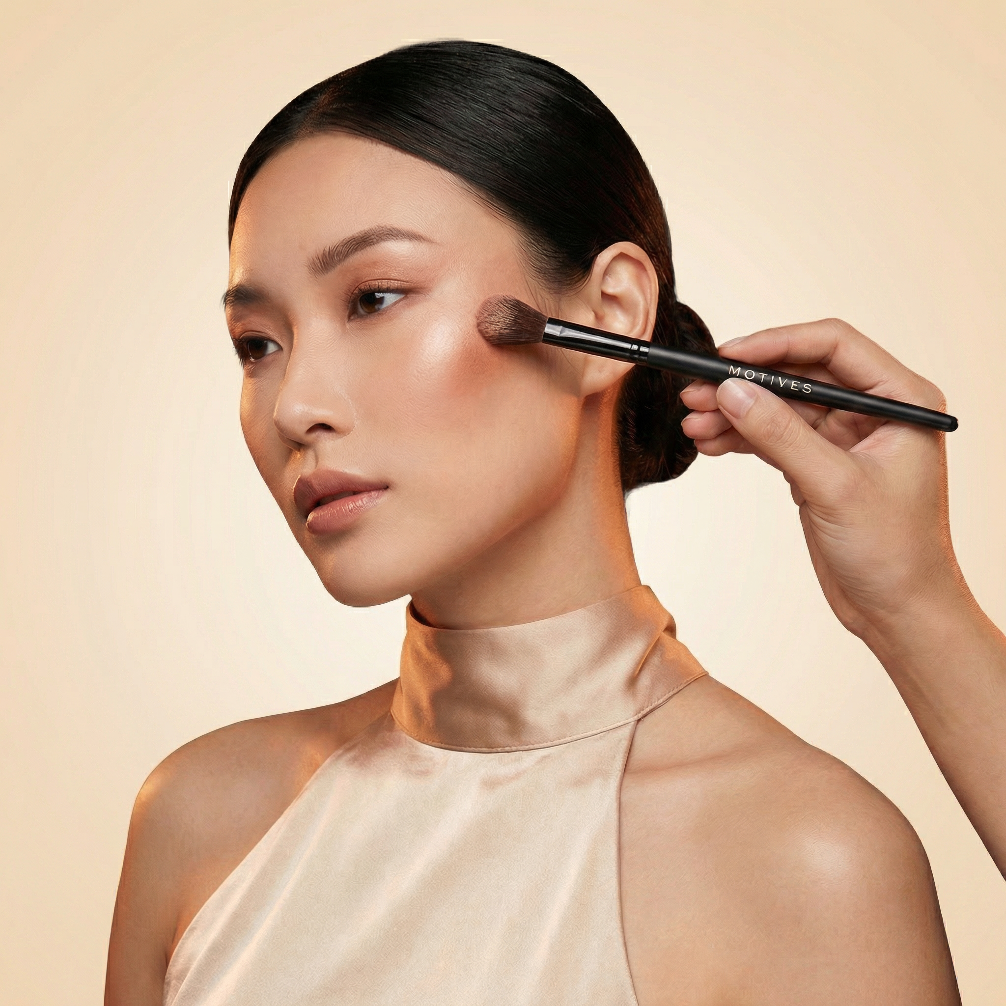 image of model getting make up done