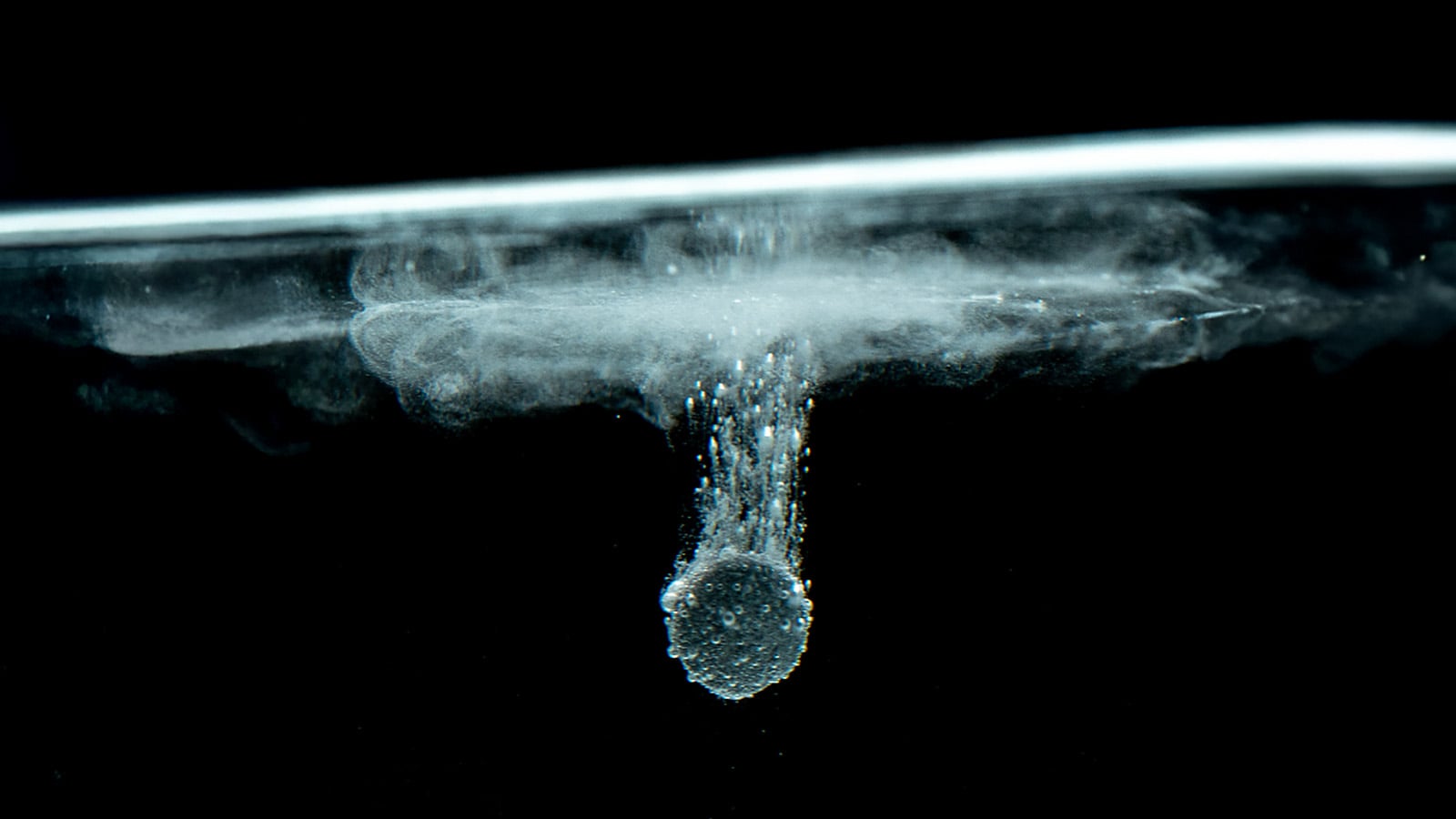 image of hydrogen tablet dissolving in water
