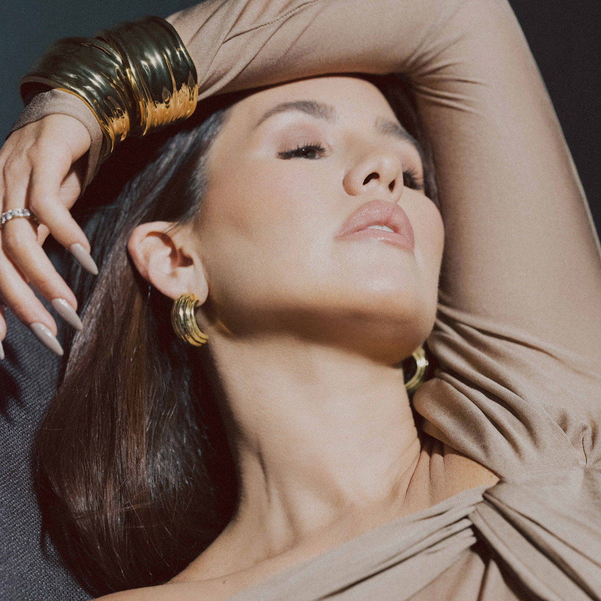 Amber wearing layered jewelry