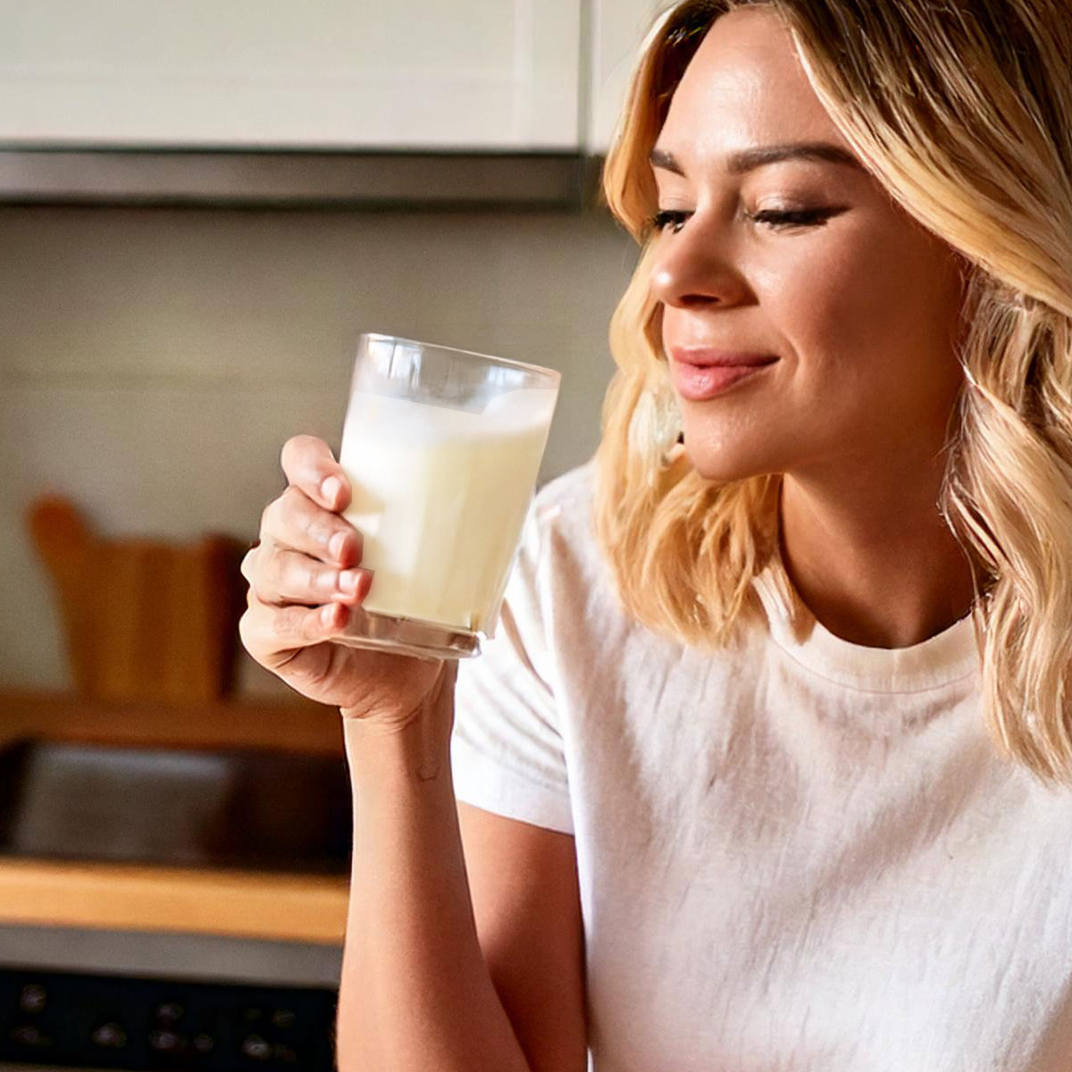 image of person drinking out of a glass
