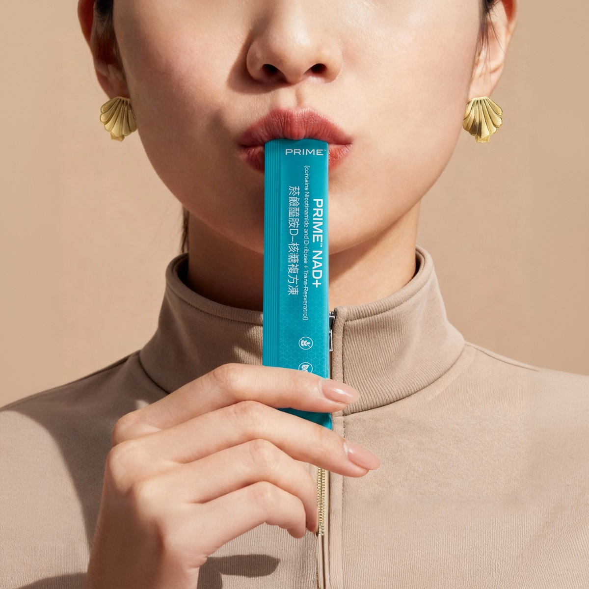 image of woman consuming a sachet of Prime NAD+
