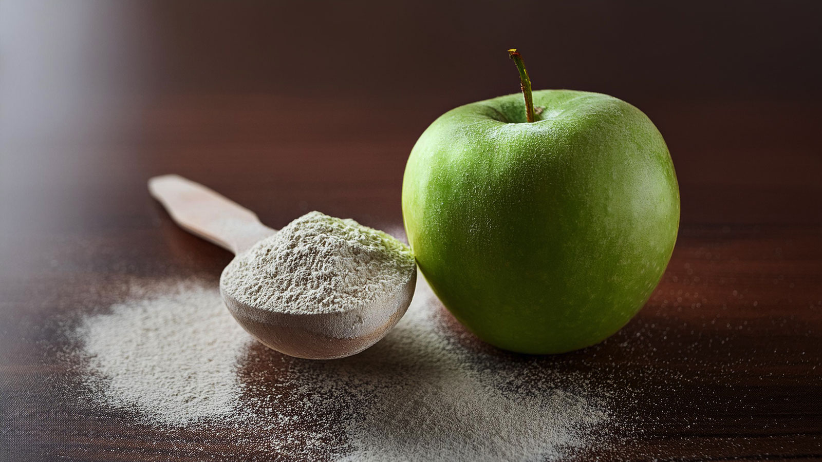 image of apple next to colostrum powder