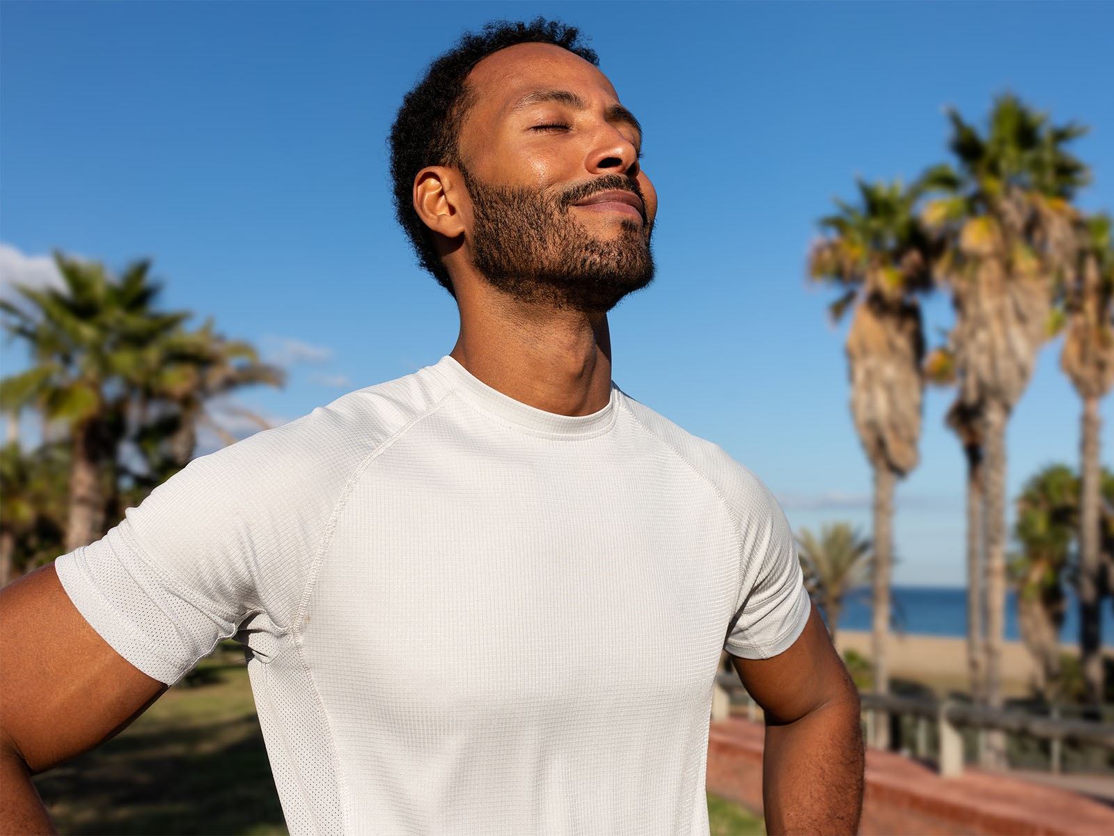 person breathing in fresh air