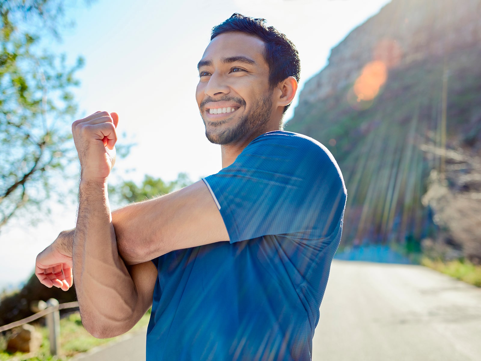 image of a man stretching his arm