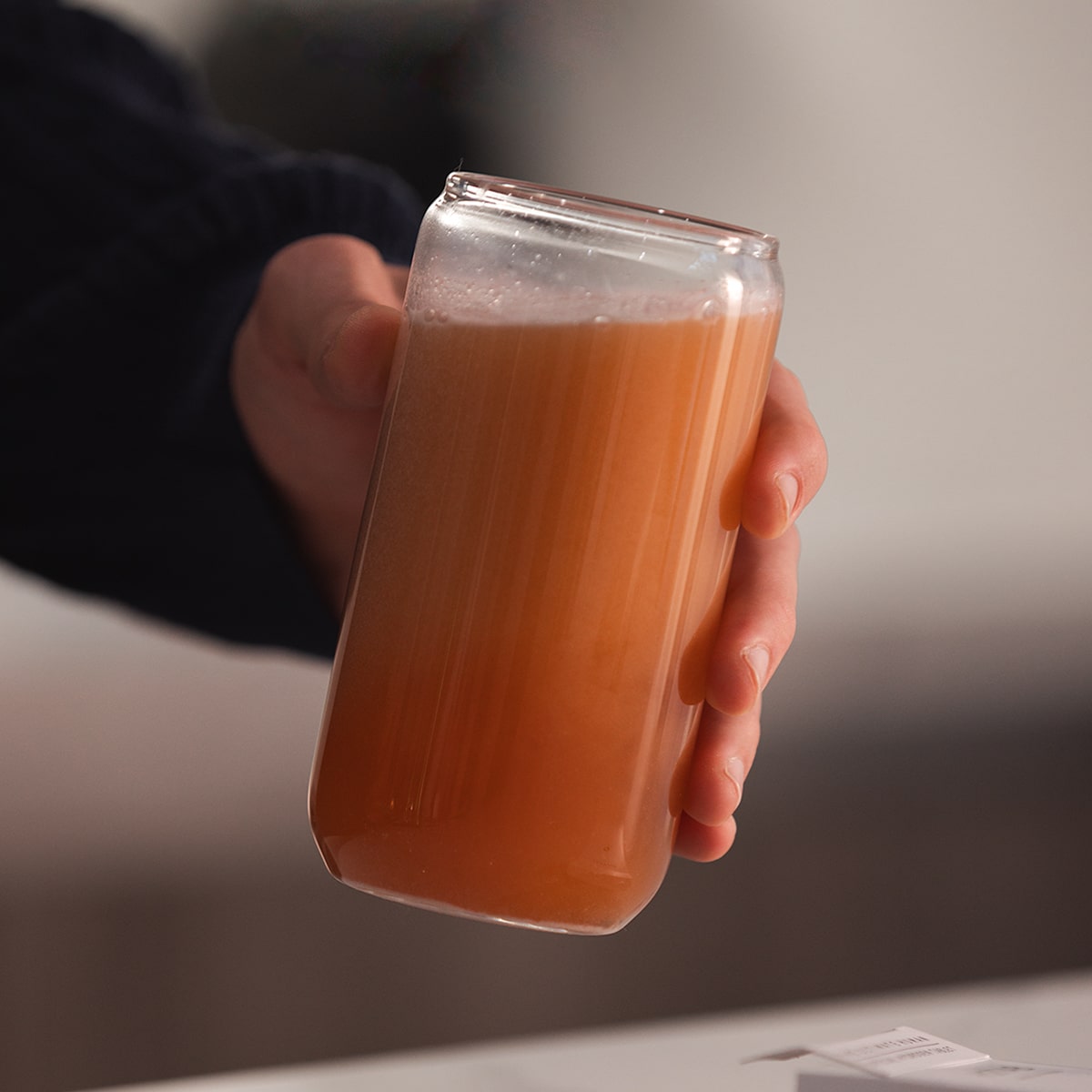 Image of person holding the solution