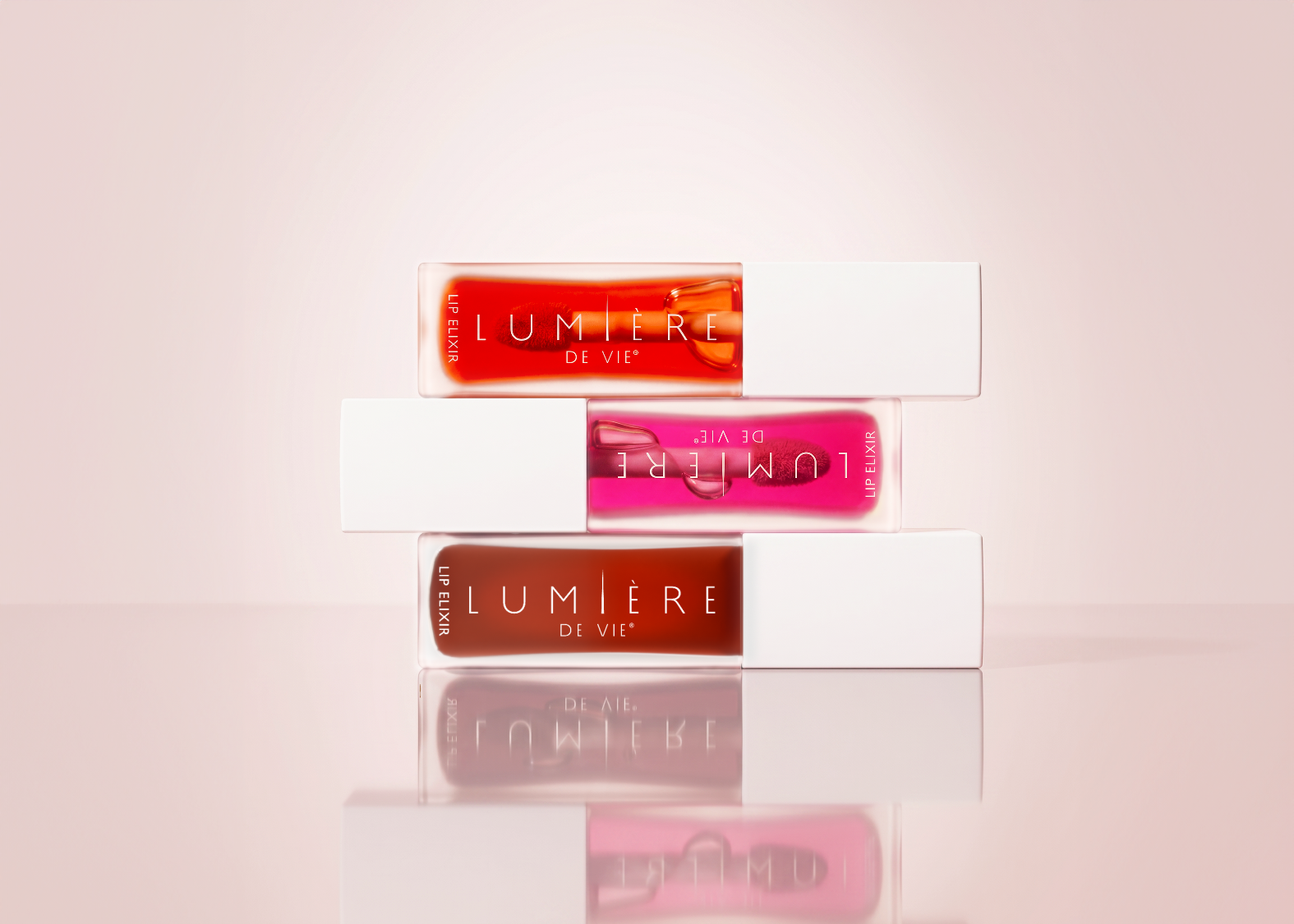 lip elixirs stacked