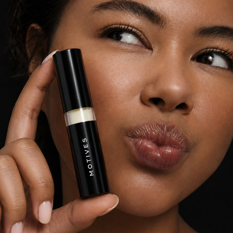 women is holding lip treatment