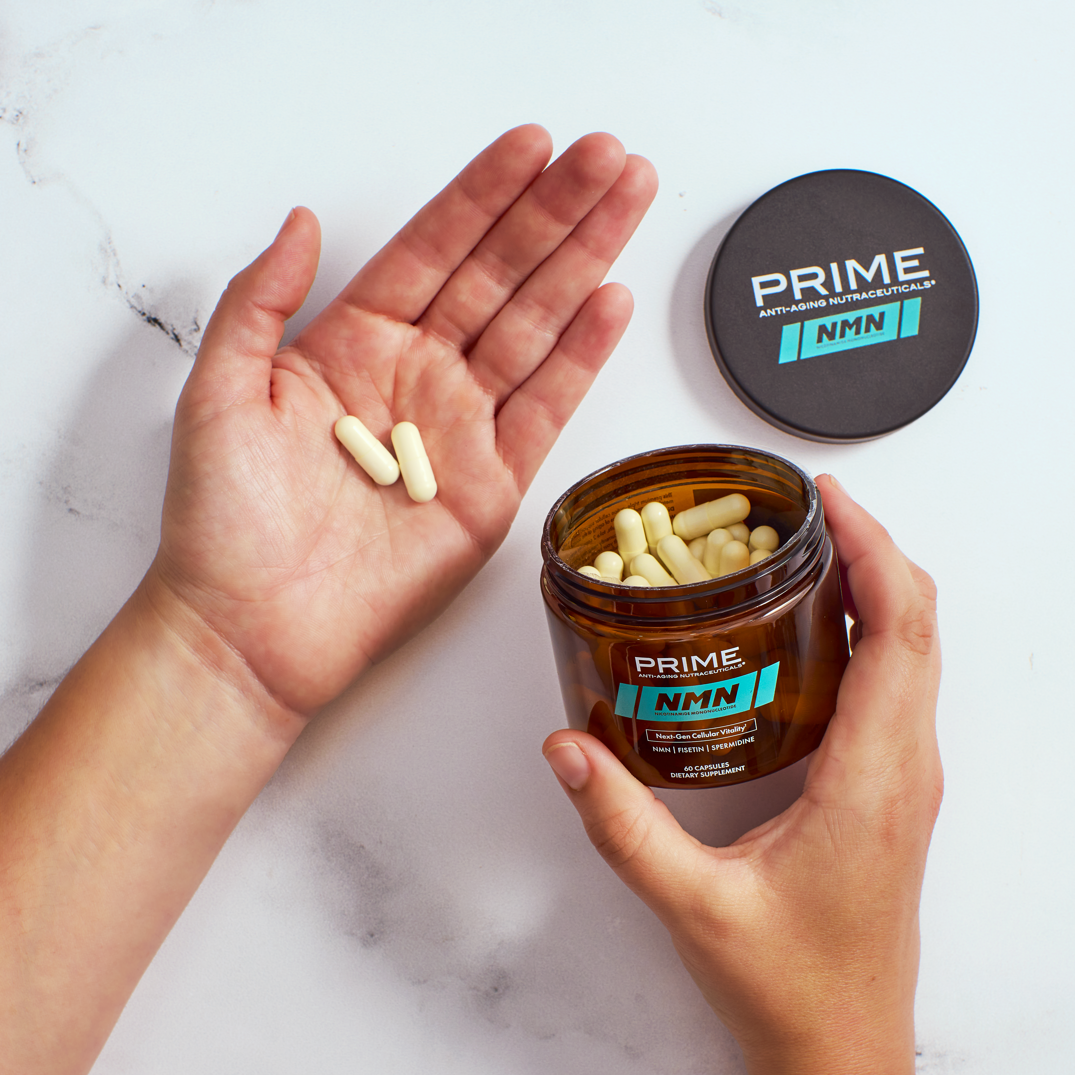 Image of a serving of Prime NMN in someone's hand