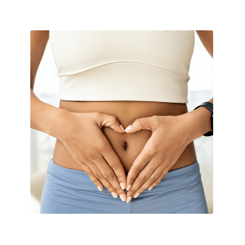 image of person with hands over stomach