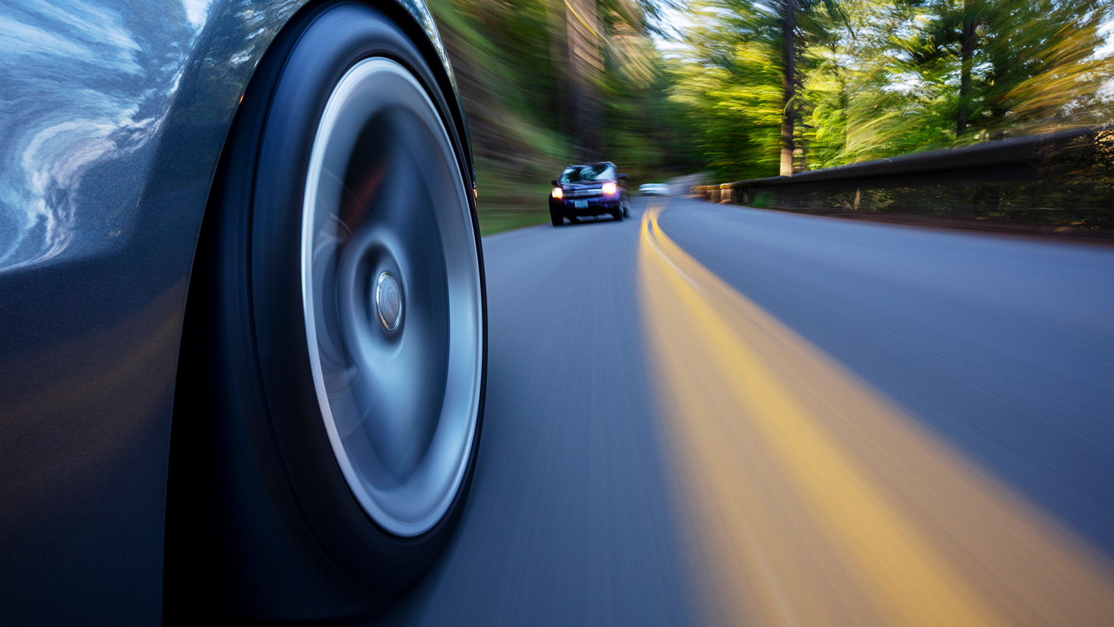 image of a car driving fast